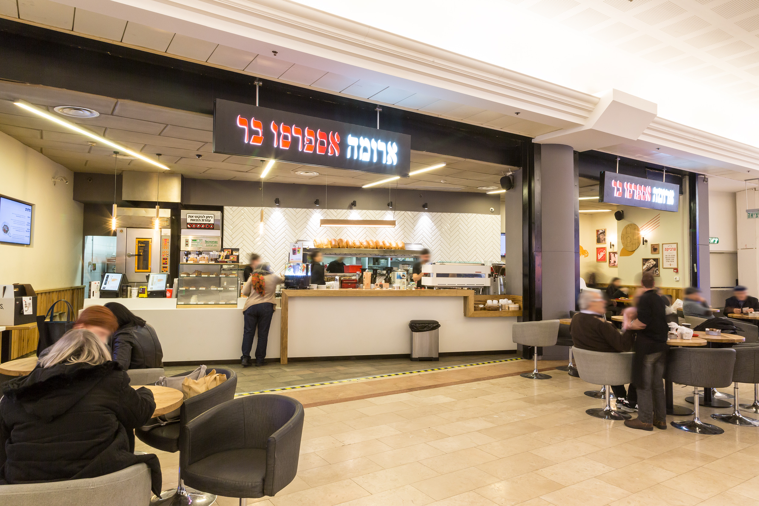 Essential seating area and counter of the Grand Canyon Haifa branch