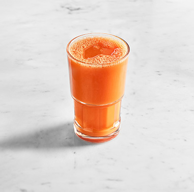 Go to a page that contains information about squeezed carrot juice on the spot - a vegan dish